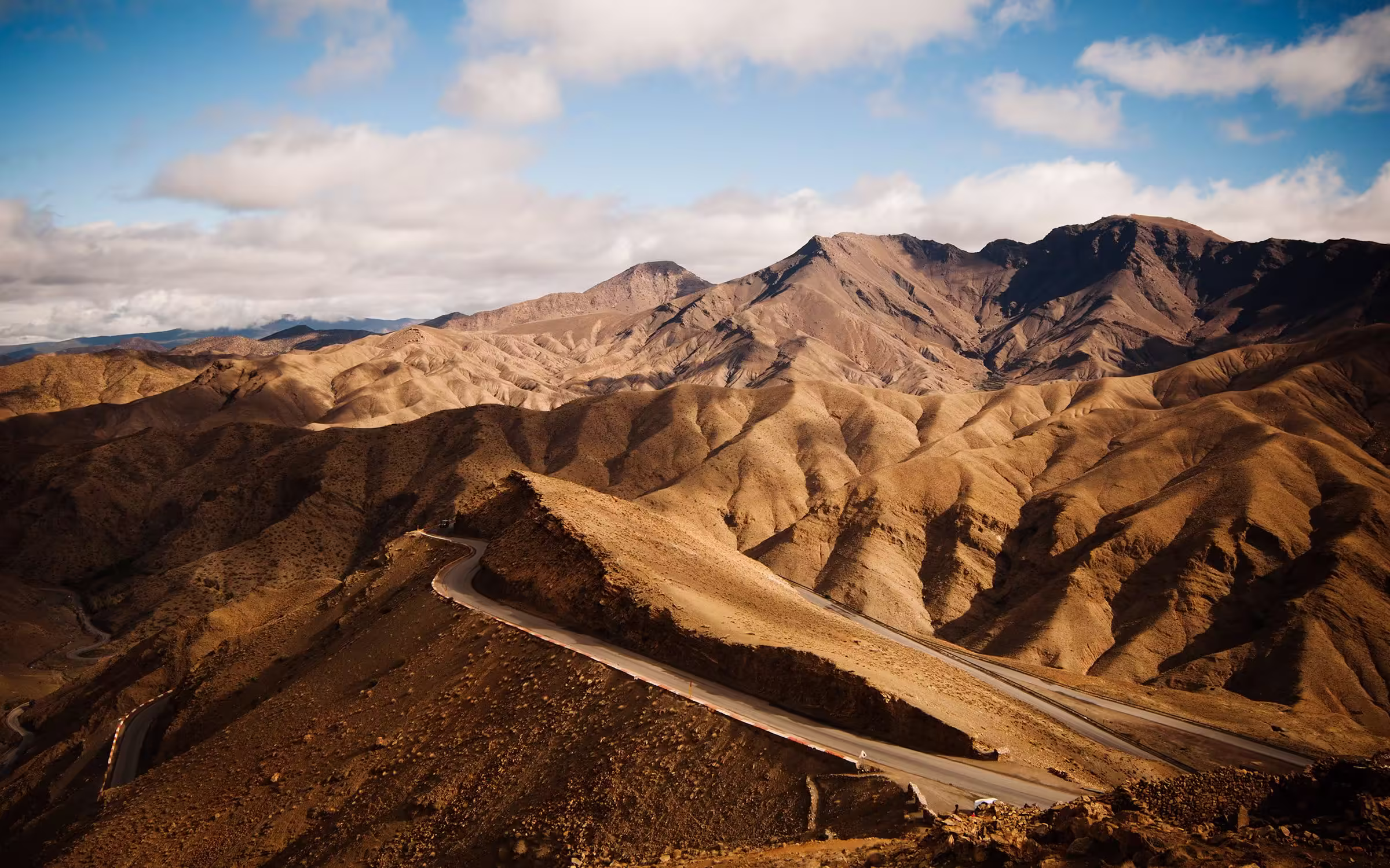 A road winding through the High Atlas Mountains near Marrakech, Morocco